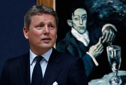 Unveiling a Hidden Woman in Picasso's Blue Period Masterpiece