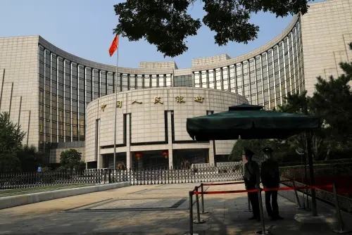 Chinese Banks Cut Dollar Deposit Rates in Response to PBOC's Call