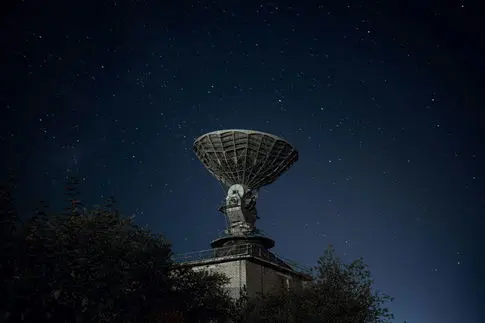 Discovery of a Fast Radio Burst in the Outskirts of an Ancient, Defunct Galaxy