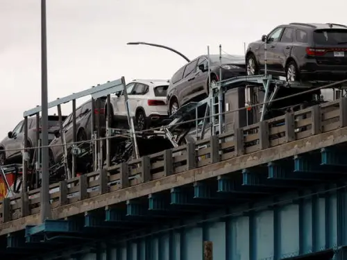 Trump Delays Tariffs on Canada and Mexico for Automakers by One Month