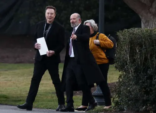 Commerce Secretary Howard Lutnick Encourages Public to Buy Tesla Amid Stock Decline