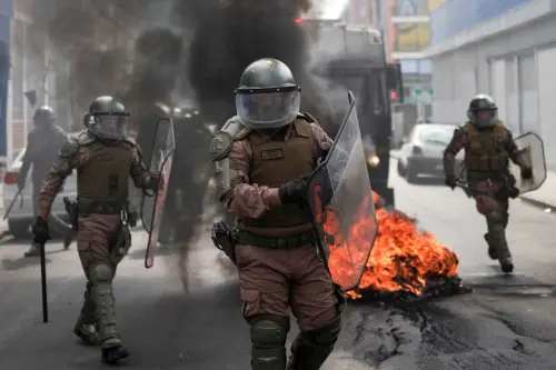 Protesters Clash with Police Outside Chile's Congress Following Delay of Fishing Law Vote