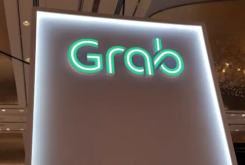 Grab Secures Up to $2 Billion Loan for Potential GoTo Acquisition, Reports Bloomberg News